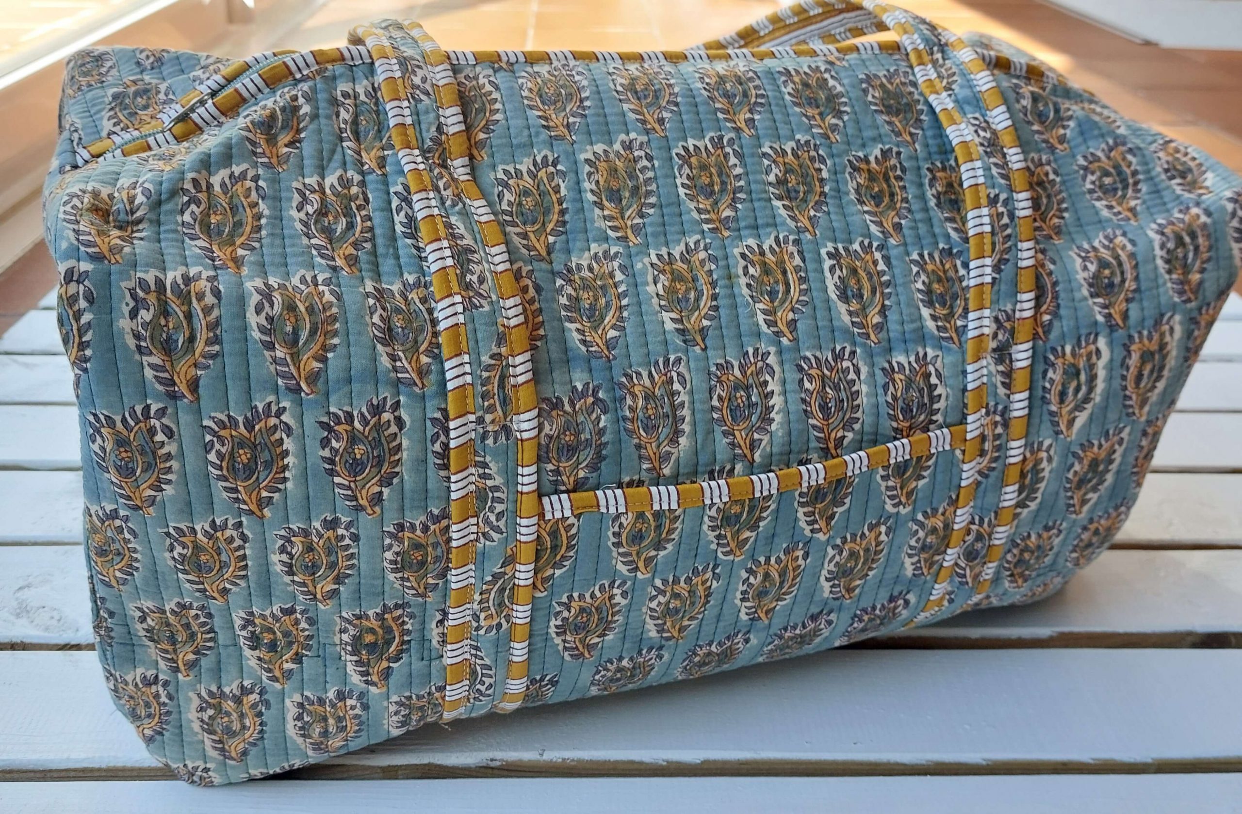 Bolsa de viaje. Colección Drops by mom 2026